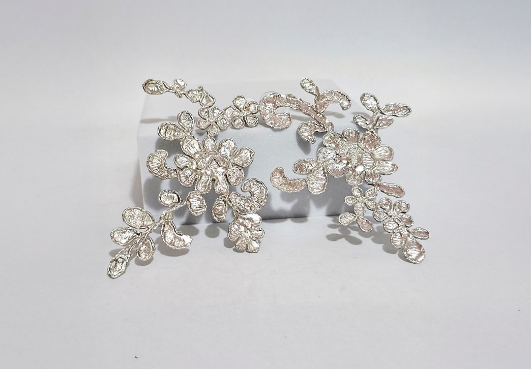 aretes de plata de la colección duelo